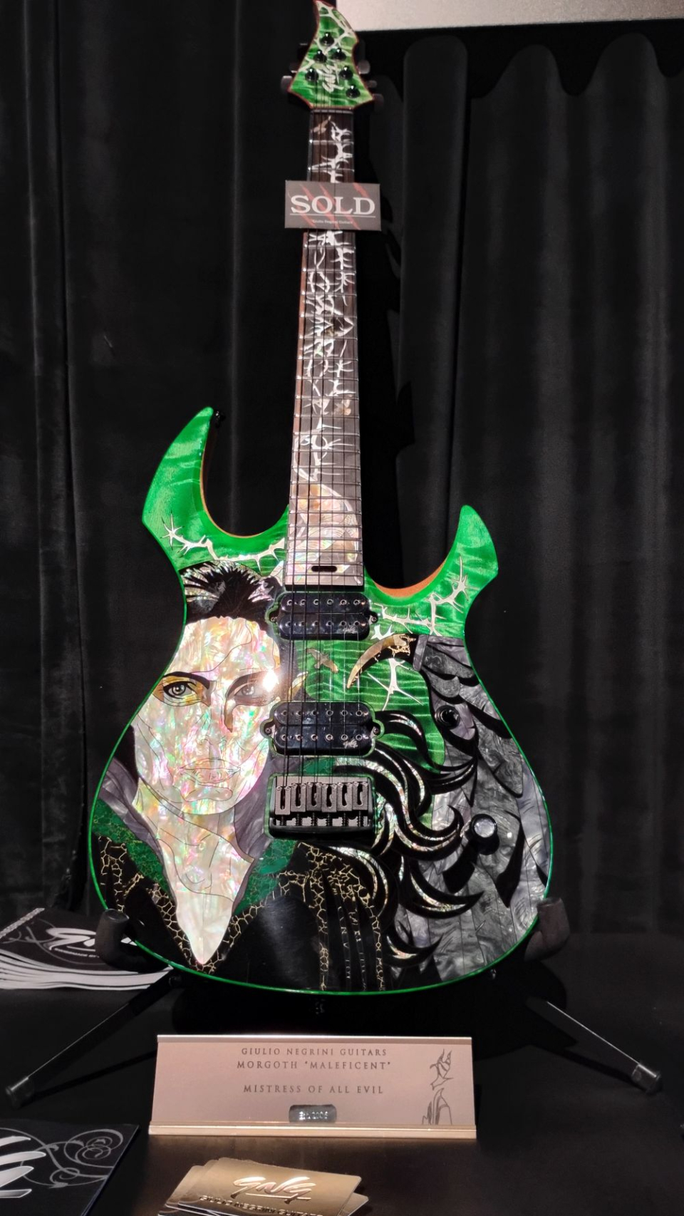 a Giulio Negrini guitar features the face of Maleficent at the namm show