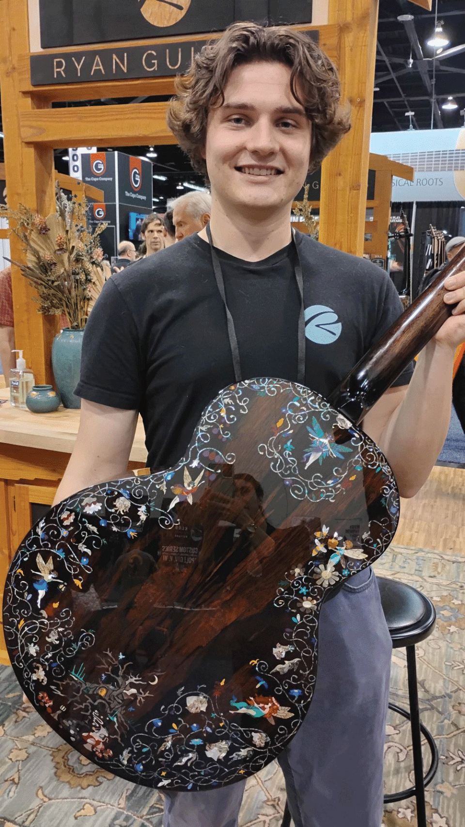 Luthier Dylan Arant of Ryan Guitars shows his guitar inspired by Grimms Fairy Tales