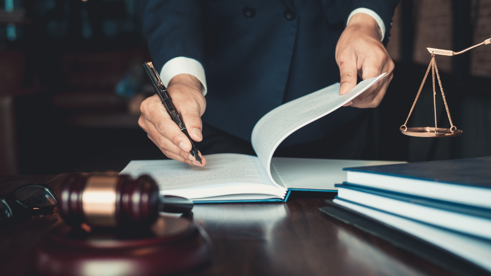 Lawyer signing documents