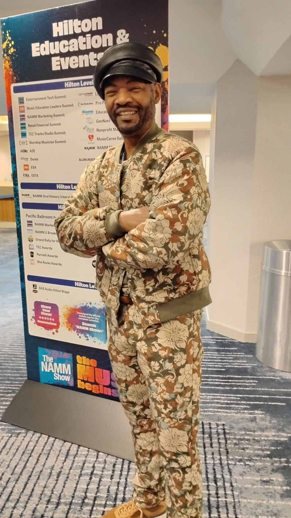 man in a floral suit at the namm show