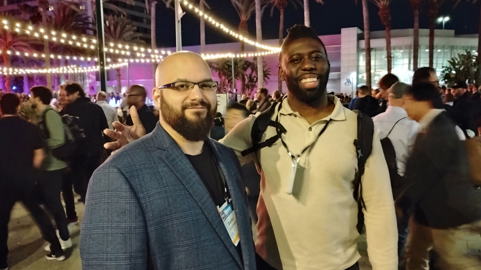 guitaro5000 or reggie guillaume and daniel naranjo smile outside the namm show 