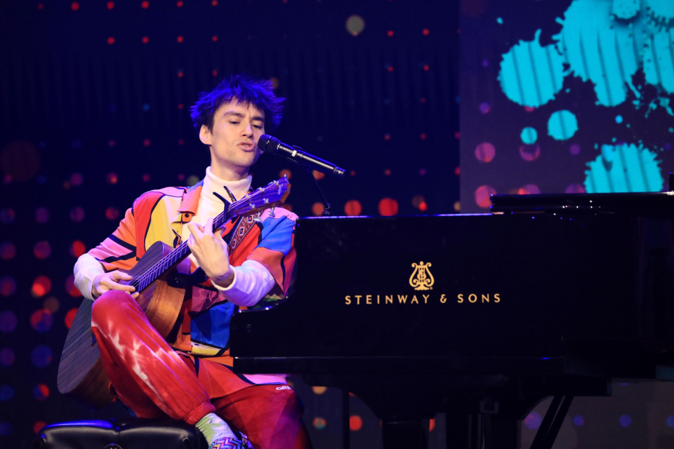 big start jacob collier plays guitar and piano at the namm show 