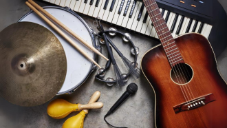 Variety of musical instruments on ground